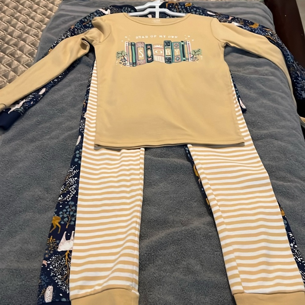 Carter’s 4 piece pajama set. New with tags size 12